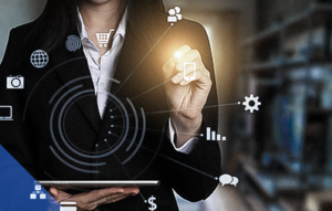 a woman in a business suit holding a tablet.