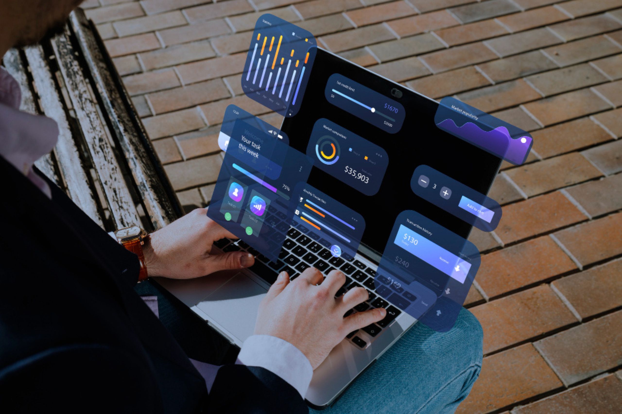 A person types on a laptop outdoors, with floating digital graphs and dashboards superimposed above the screen, representing data analytics.